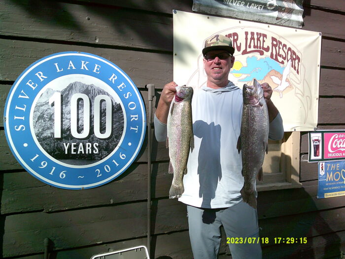 Dieter of Harbor City with a 4 pound 10 oz and a 4 pound 11 oz Rainbow caught from the shore of Silver Lake on a Lure