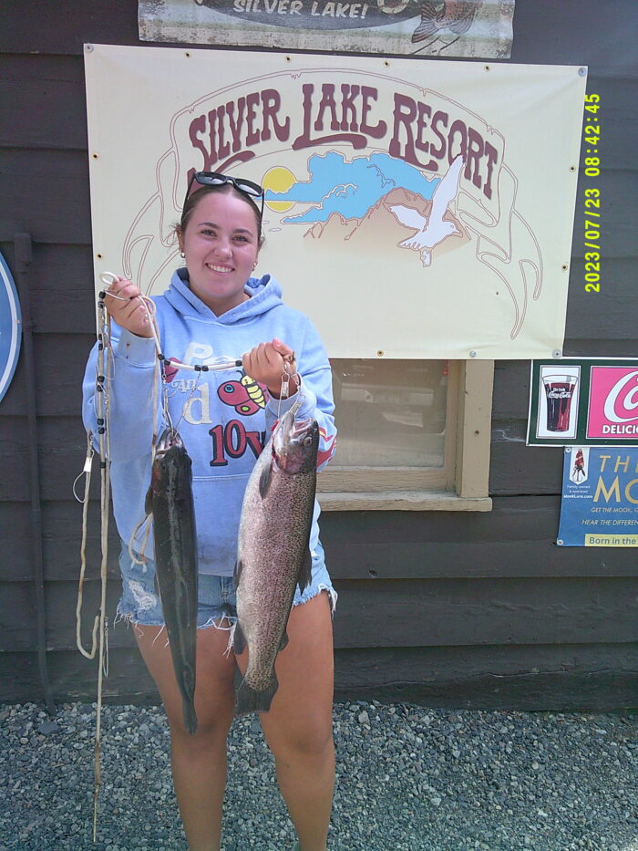 Mackenzie Longueria with a 5 pound 10 Oz and a 5 Pound 11 oz Rainbow caught from a boat on Silver Lake using a Thomas Buoyant 